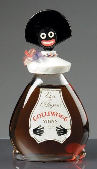 Vigny «Le Golli-Wogg» - (1918) Version «eau de cologne» en verre incolore pressé...