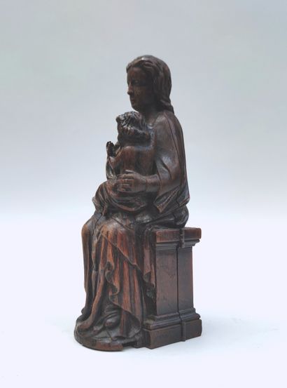 null Sainte Trinité 
SCULPTURE en bois représentant une vierge à l'enfant, la partie...