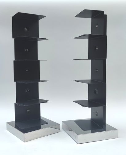 null Pair of black lacquered and chromed metal "design" bookcases, multiple editions...