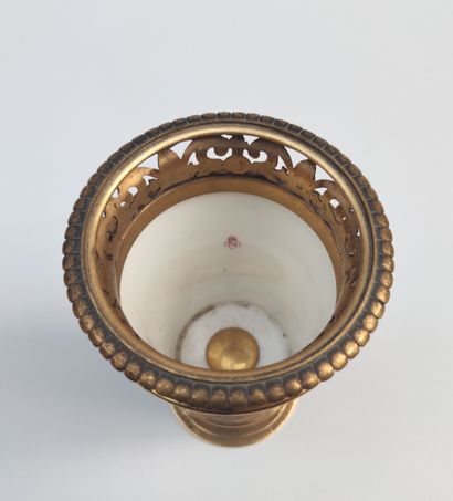 null VASE COVERED KNOWN AS POT POURRI of conical form out of porcelain and gilded...