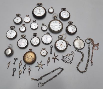 null Sixteen steel and silver POCKET WATCHES; pocket watch keys 
Lot sold as is,...