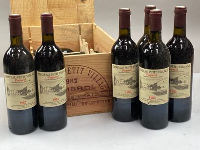 null 12 bouteilles Château Petit Village 1982 Pomerol CB (4 NTLB)