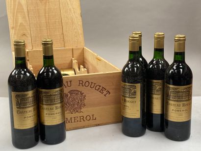 12 bouteilles Château Rouget 1982 Pomerol...