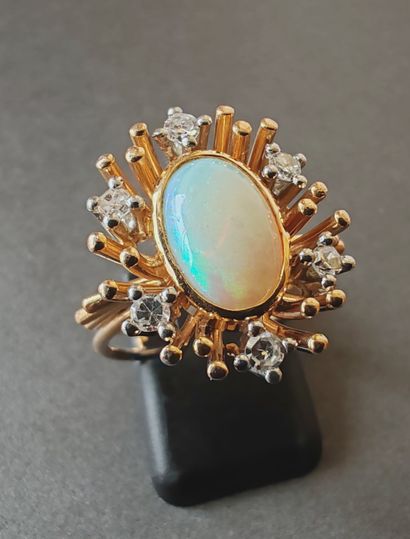RING in yellow gold 750°/00 set with an opal...