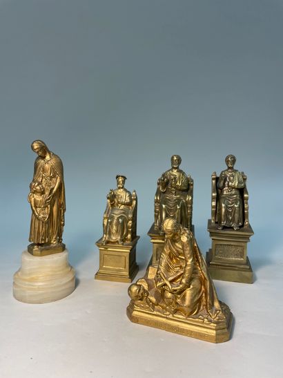 Lot de cinq sculptures en bronze ciselé doré
H....