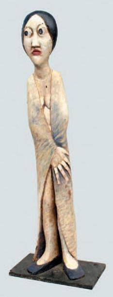 Pierre MERLIER (1931) FEMME AU MANTEAU BLANC Sculpture, taille directe sur bois,...