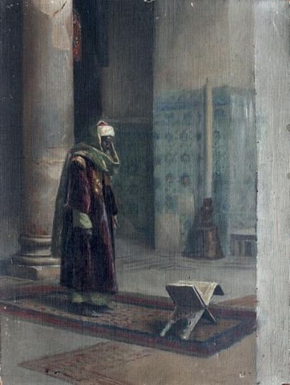 ÉCOLE ORIENTALISTE, FIN DU XIXe SIÈCLE / 1900 Homme arabe debout devant un coran...
