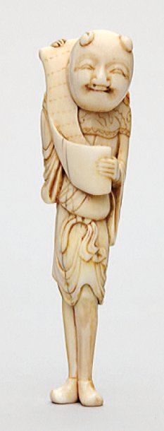 null NETSUKE en ivoire représentant Kanzan tenant son rouleau. Japon, XVIIIe siècle....
