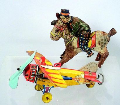 null Clown sur un poney en métal chromolithographié (taché) + avion mécanique à ...