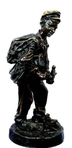 null «Le jeune colporteur de Jouets MARTIN» superbe statuette en bronze signée A.CARDONG...