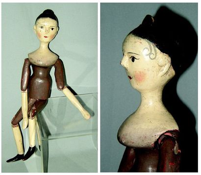 null Curieuse poupée en bois de fabrication allemande entièrement articulée et peinte...
