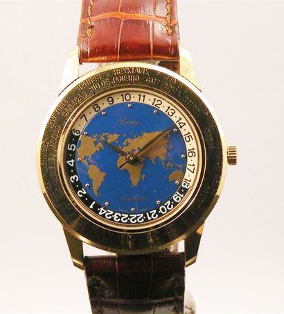 BERNAY vers 1990 WORLD TIME ronde en métal doré, cadran map, lunette tournante interieure...