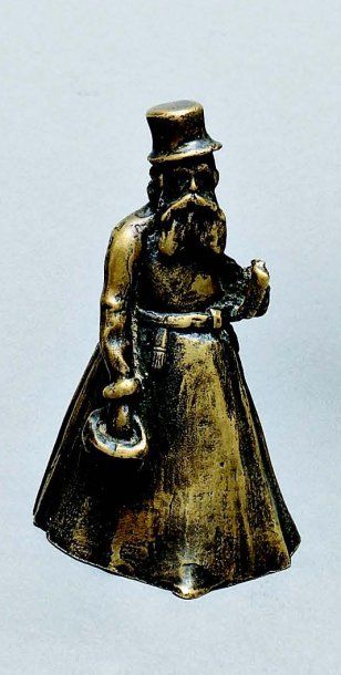 Clochette en bronze représentant un cocher....