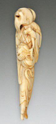 null NETSUKE en ivoire représentant un Sennin debout. Japon, XVIIIe siècle. Haut....
