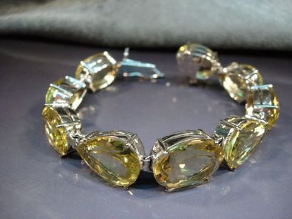 null Bracelet en argent serti de quartz jaune vert, ovales facettés et taillés en...