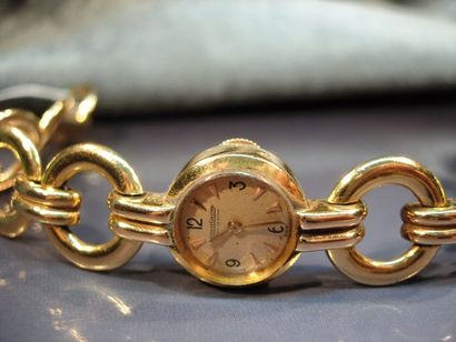 JAEGER LECOULTRE montre bracelet de dame en or jaune, à boîtier rond et bracelet...