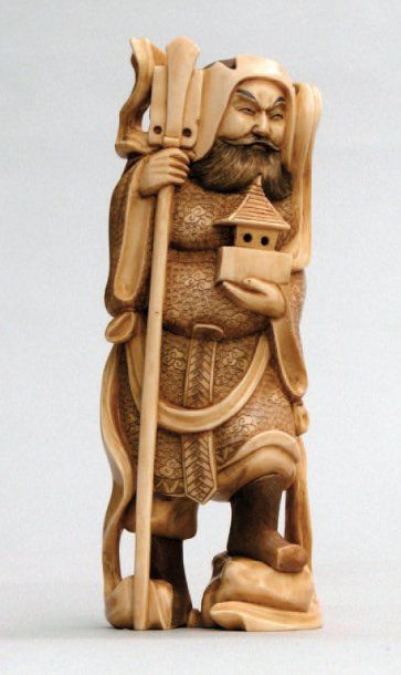 OKIMONO en ivoire représentant le dieu de...