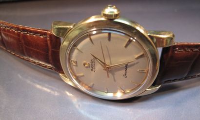 null OMEGA, montre Seamaster automatique en or et acier sur bracelet cuir