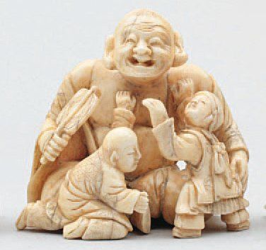 null NETSUKE OKIMONO représentant Hoteï et deux Karako. Signé Masayuki. Japon Meiji,...