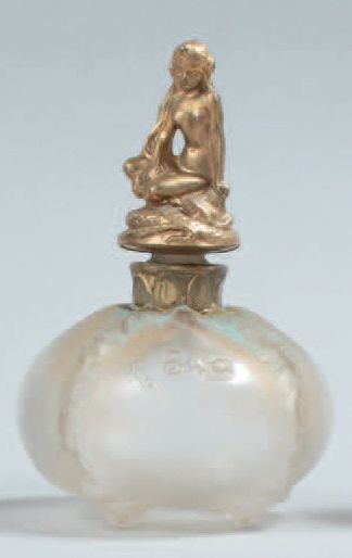 null Lubin " Eva " - (années 1920)

Flacon en verre incolore pressé moulé dépoli...