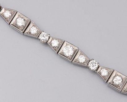 null Bracelet ligne en platine (mascaron), serti de diamants taille brillant pour...