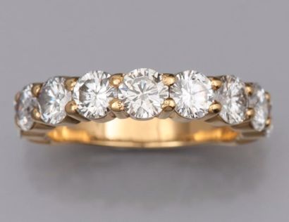 null Alliance dite 3/4 en or jaune 750°/00 (hibou) , sertie diamants taille brillant...