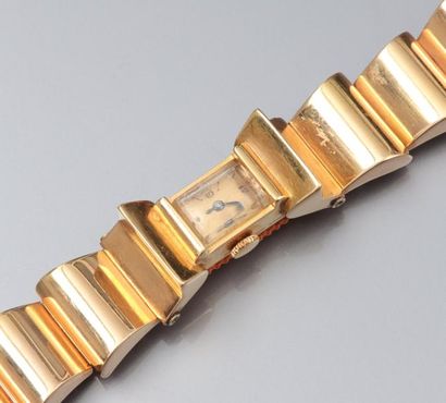 null Montre bracelet en or jaune 750°/00 (tête d'aigle) boitier rectangulaire, bracelet...