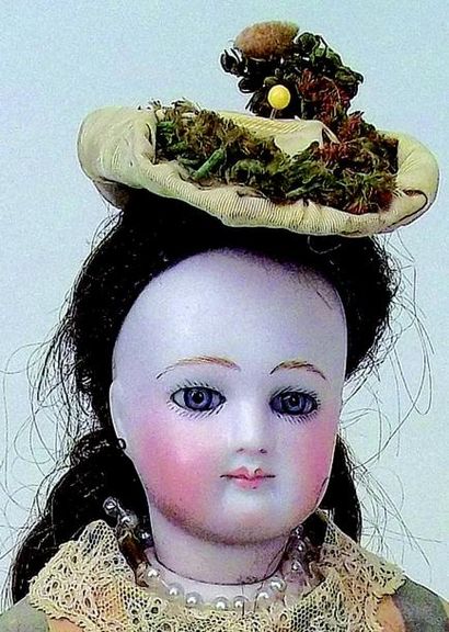 null Jolie poupée parisienne par Emile Louis JUMEAU, tête en biscuit pressé pivotante...