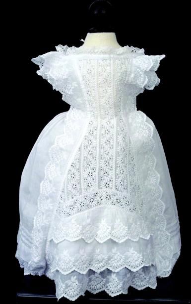 null Robe de bébé articulé en coton blanc avec décor de dentelle crantée, manches...