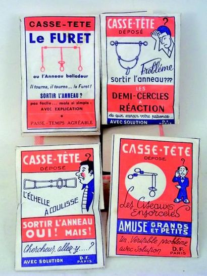 null «CASSE-TETE» ensemble de quatre casse tête en pochettes d'origine dans une petite...