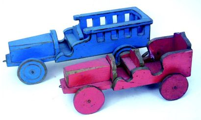 null Voiture en bois peinte en rouge. L 35 cm. + petit camion bleu. L 30 cm.