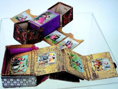 null Deux boîtes à aiguilles miniatures en cartonnages avec scènes enfantines chromolithographiées....