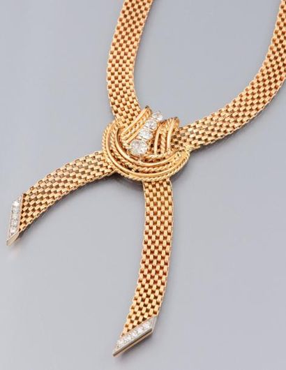 null Collier ruban en or jaune 750°/00, à maille articulée, et fil torsadé, serti...