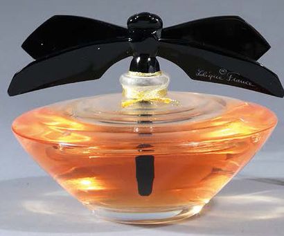 Lalique parfums Libellule - (2013)
Présenté dans son écrin en bois gainé de cuir...