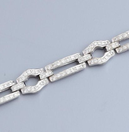 null Bracelet en or gris 750°/00, à maillons articulés sertis de diamants taille...