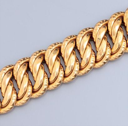null Bracelet en or jaune 750°/00 maille tressée. 50.10 g. L : 19.5 cm. Poinçon ...