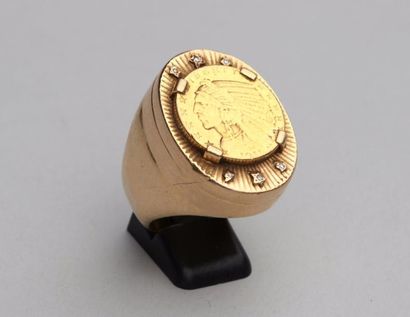 null Bague chevaliere en or jaune 750°/°° ornée d'une monnaie américaine en or à...