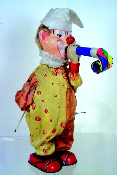 null Amusant clown mécanique avec tête en carton moulé, costume en coton bicolore,...