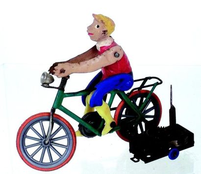 null -« Cycliste » petit jouet mécanique représentant un jeune cycliste en métal...