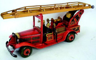 null -Superbe grande voiture de pompiers mécanique avec échelle mécanique et phares...