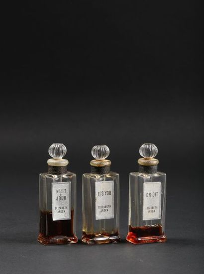 null Elizabeth Arden - (années 1950)

Trois flacons-testeurs en verre incolore, modèles

"borne...