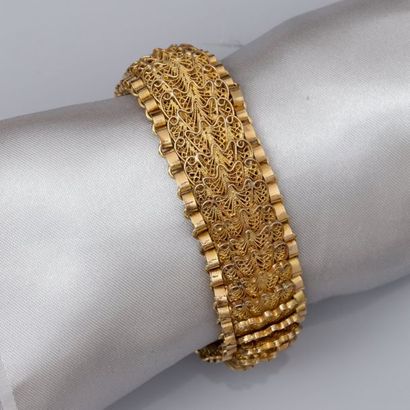 null Bracelet en or rose 750 millièmes, à maillons à décor filigrané, bordés de chaîne...