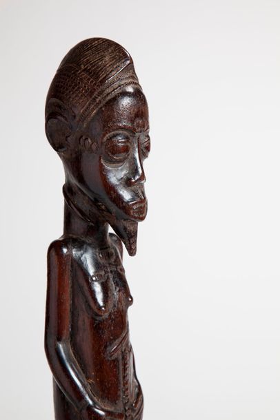 null BAOULE, Côte d'Ivoire

Statue masculine en bois lourd patiné, de type "Blolo...