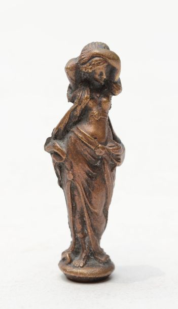 null Cachet en bronze representant un couple en habits facon XVIIe siècle, chiffré

Haut:...