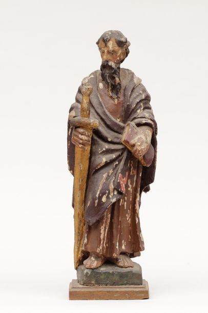 null Sculpture en bois polychrome representant Saint Mathieu tenant l'épée de son...