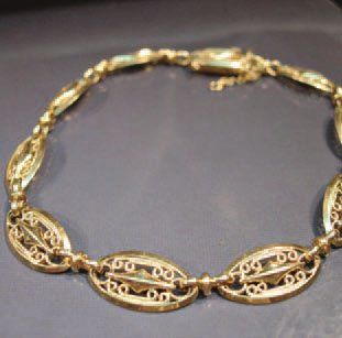 null BRACELET EN OR JAUNE À MAILLONS FILIGRANÉS. Vers 1900. Poids : 16.30g. Longueur...