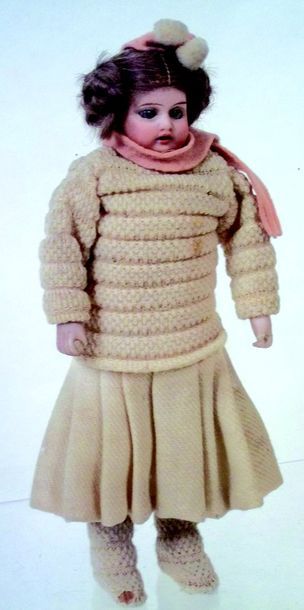 null Candy box représentant une petite fille habillée en habits d'hiver, tête en...