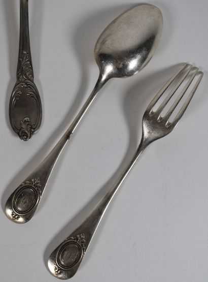 null SUITE OF TWO TABLE COUVERTS in 950/1000th silver, rocaille spatula model. Marked...