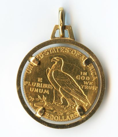  18k (750 mils) yellow gold pendant surrounding a 1914 American $5 gold coin. Side...