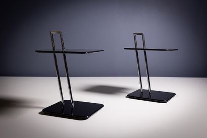 A PAIR OF SIDE TABLES by Eileen Gray A PAIR OF EILEEN GRAY BLACK RECTANGLE SIDE TABLES,... Gazette Drouot